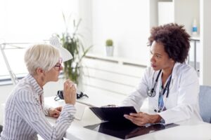 doctor explaining how stroke vital signs monitoring can help in how to avoid stroke